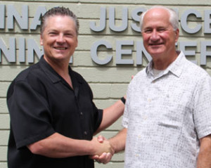 Ron Lowenberg, CJTC Dean/Director welcomes Chief Hick to his team.
